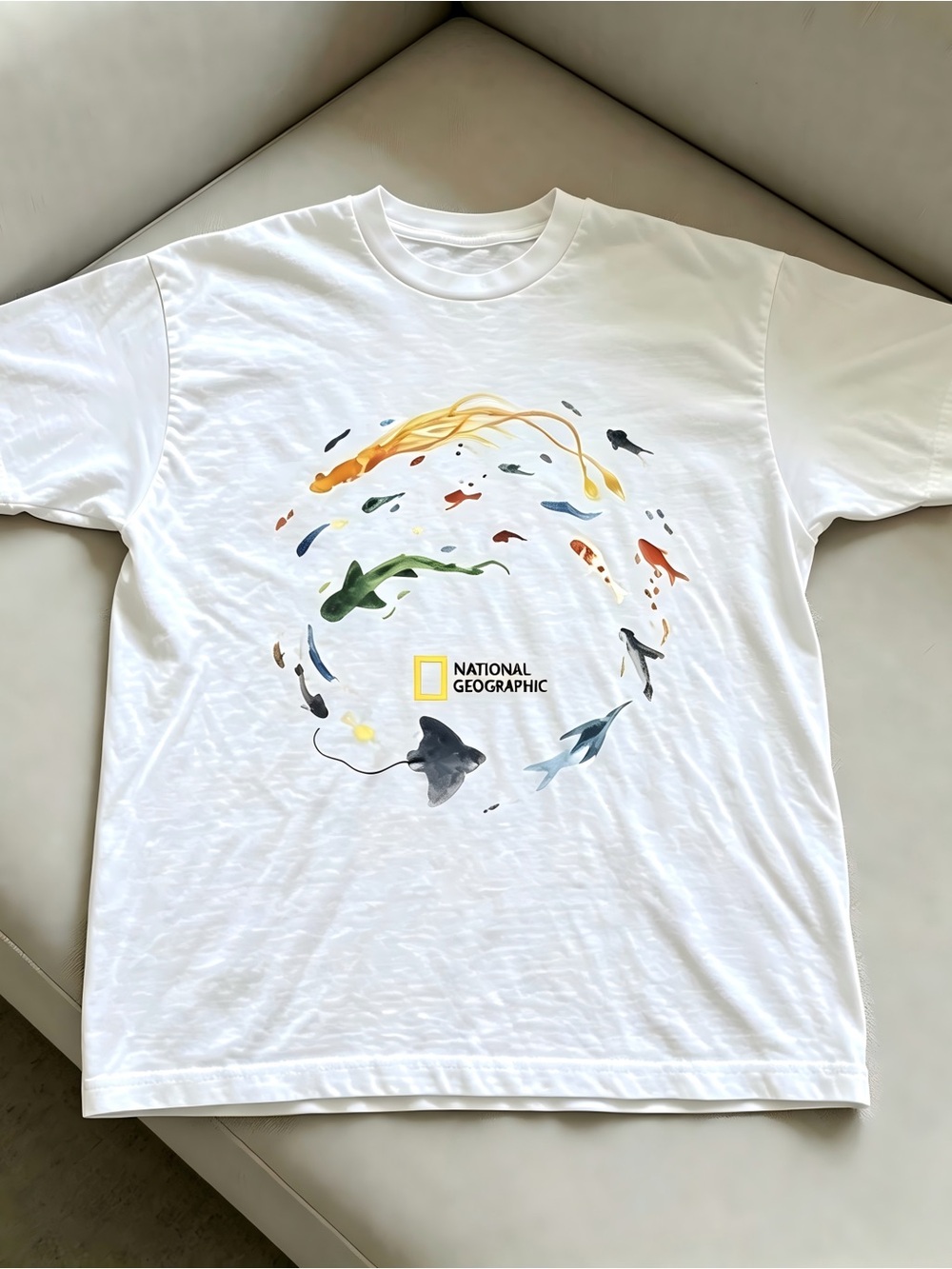 National Geographic "Go With The Flow" Fish in White Women Men T-shirt Unisex